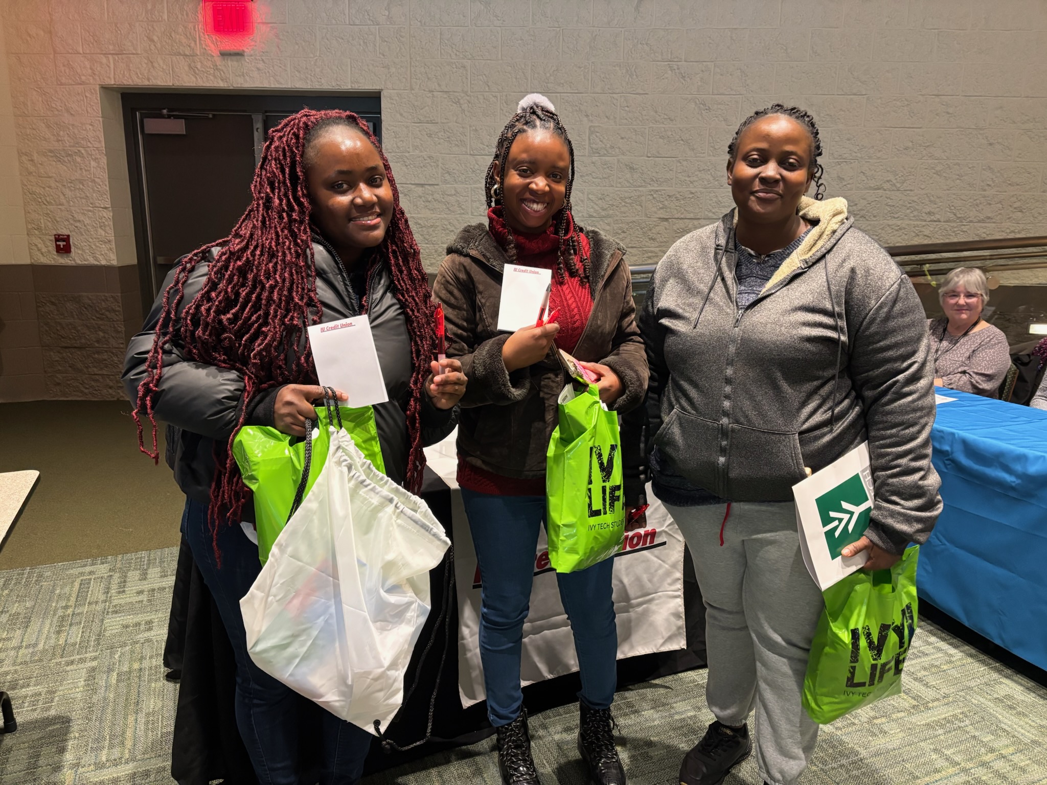 Photo of three Ivy Tech Students at the resource fair