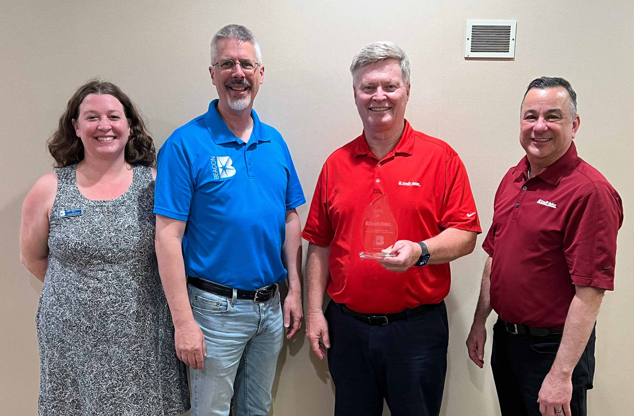Photo of Beacon and IU Credit Union representatives